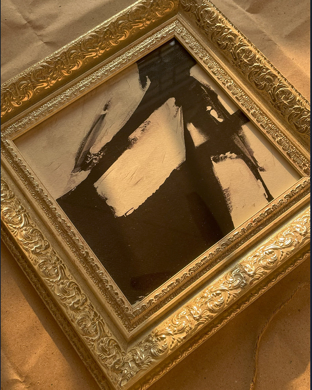 Beige gold wall frame with digital art styled for decor