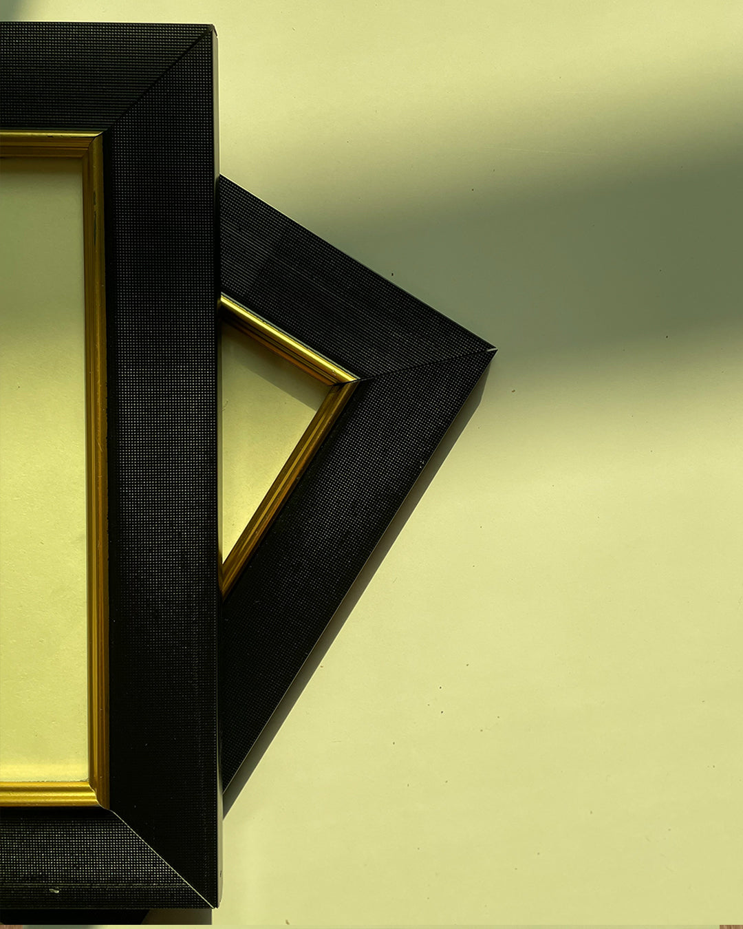 Close-up of black PVC wood Islamic frame with gold artwork