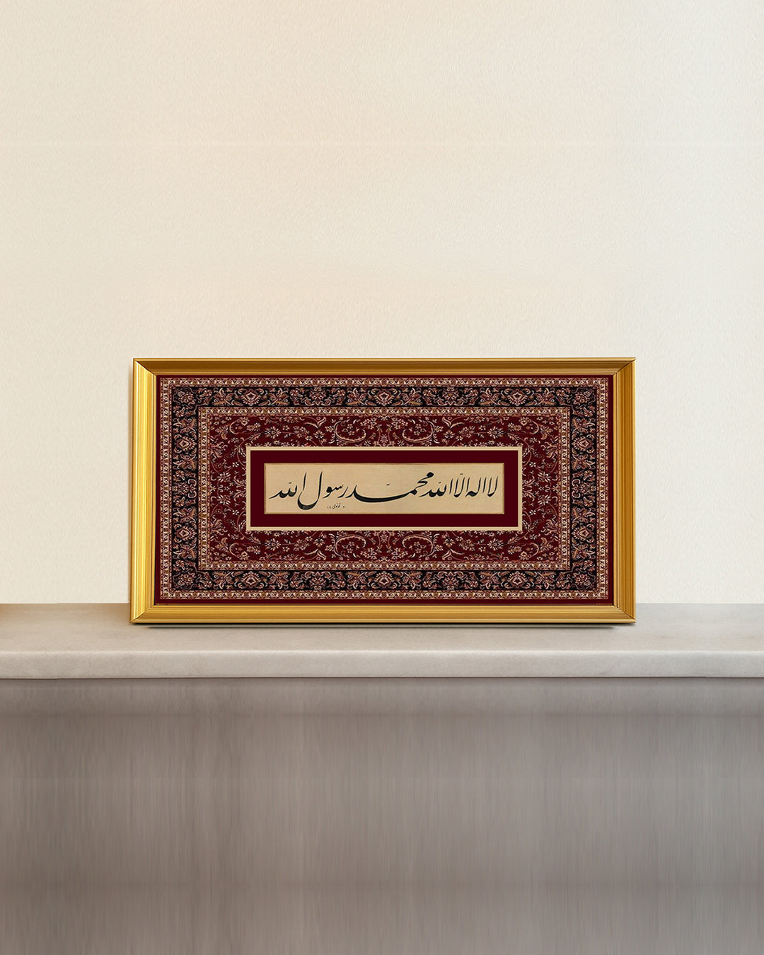 Close-up of Kalma text with frame finish