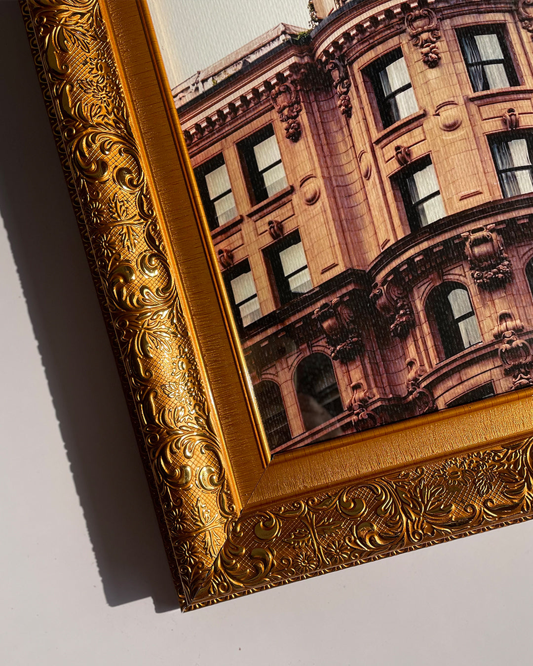 Close-up shot of textured gold frame details