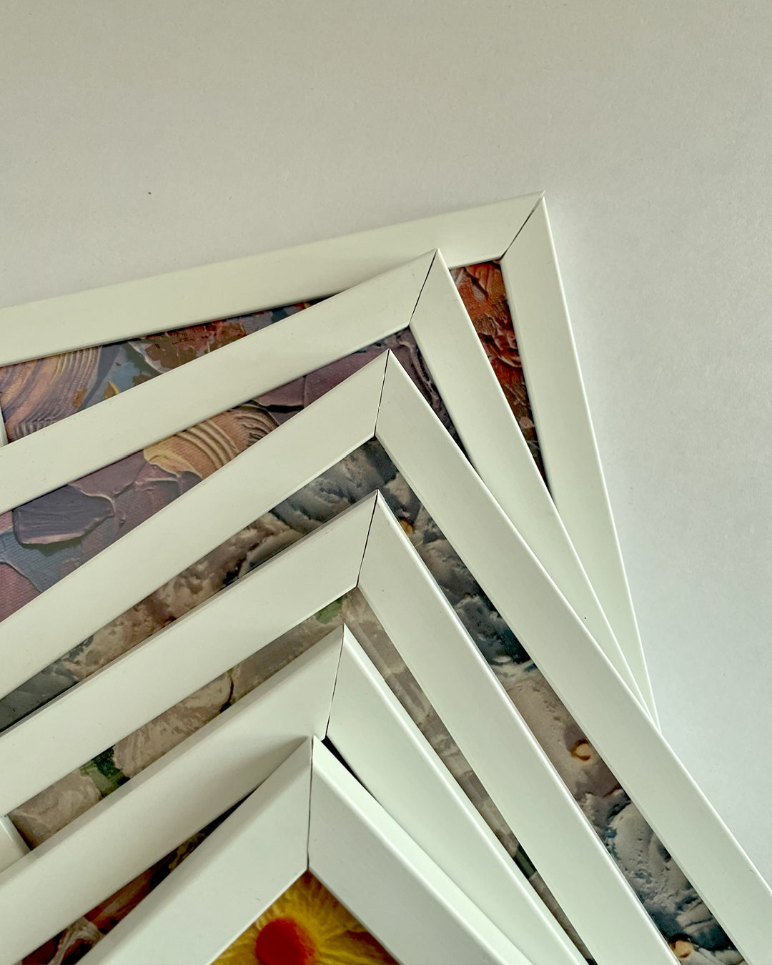 Close-up of white PVC wood molding with museum-grade glass glazing