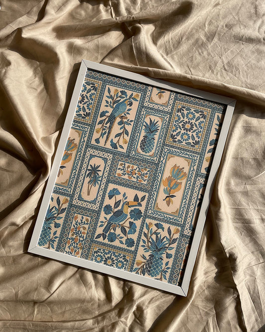 Flat lay of Blue Jay frame featuring intricate blue artwork and gold accents