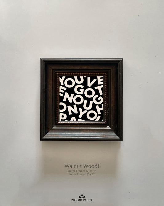 Walnut wood Islamic wall art frame on beige wall